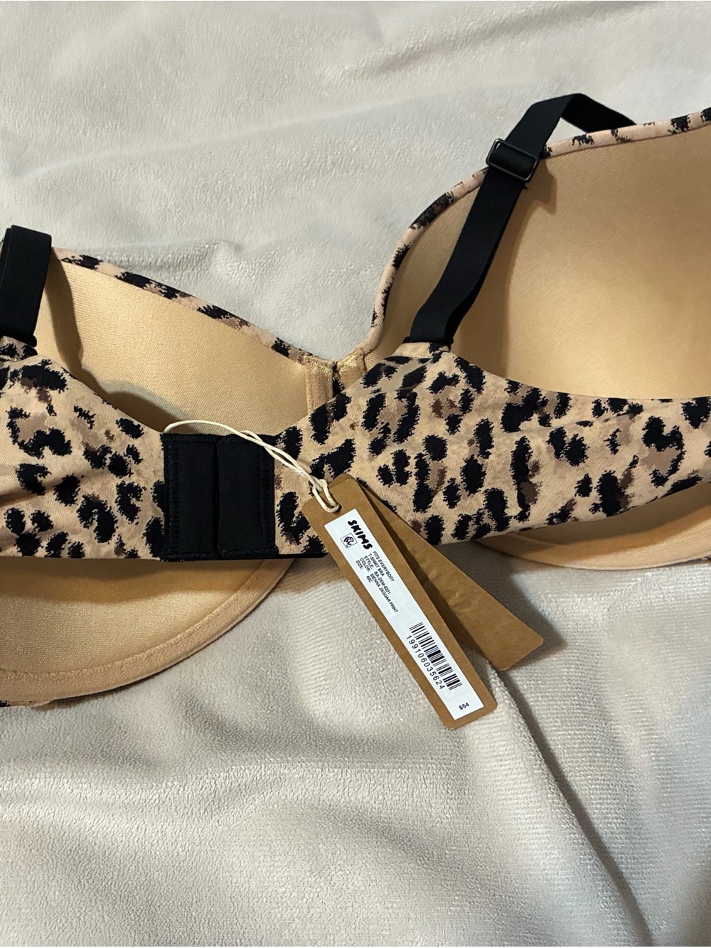 SKIMS Leopard Print Molded T-Shirt Bra in Beige & Black - Picture 3 of 4